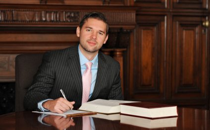 Attorney sitting at table with